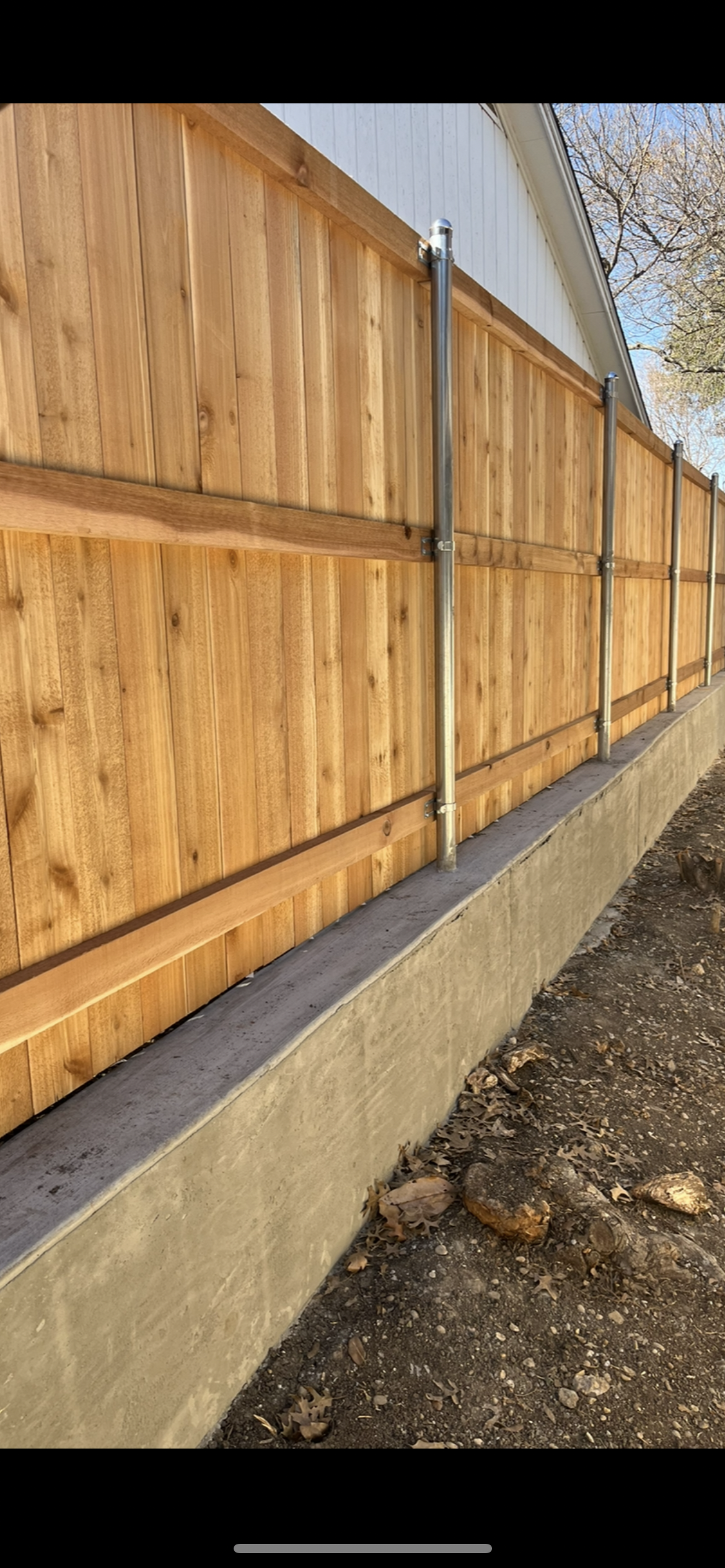 Cedar privacy fence installation