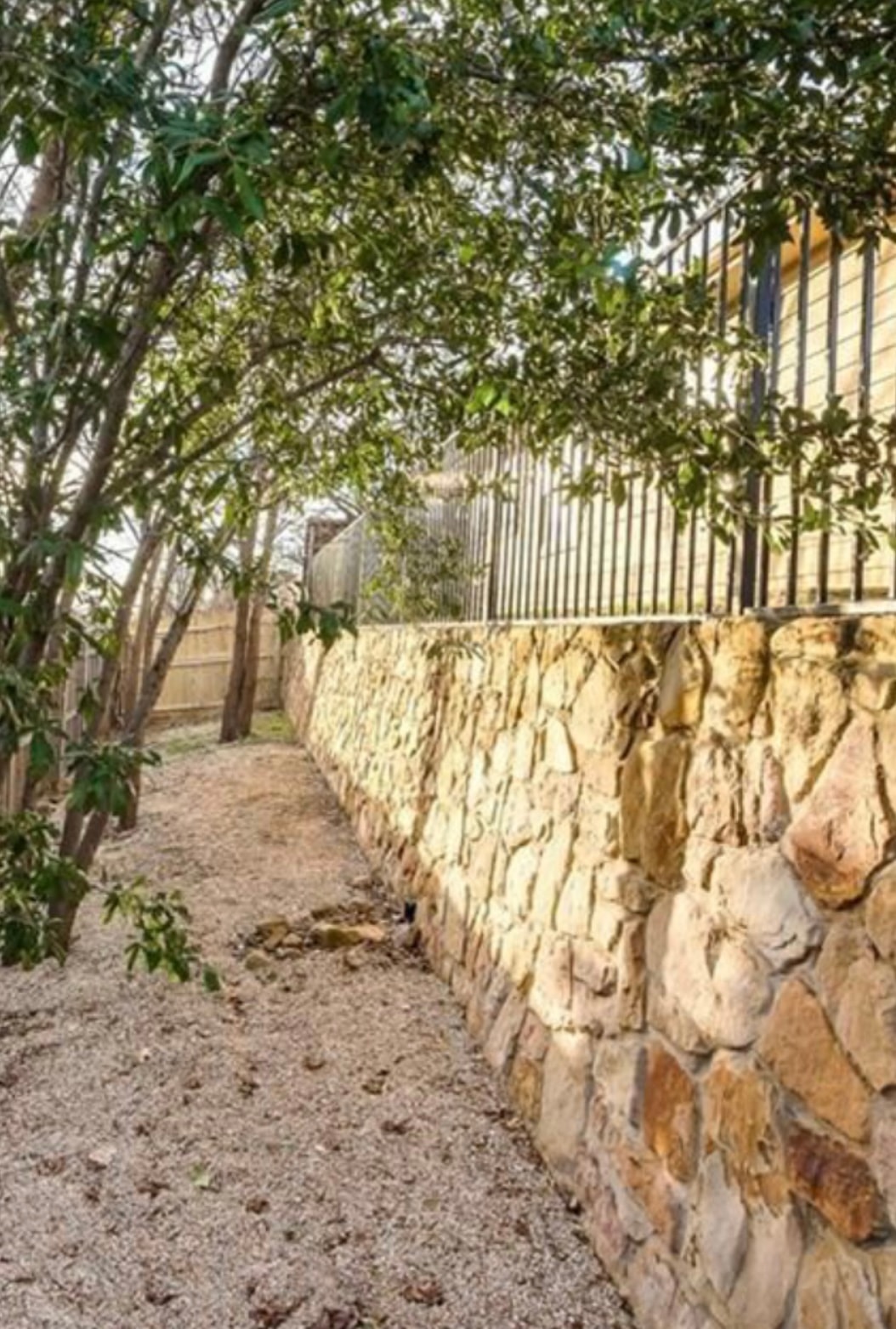 Natural stone retaining wall