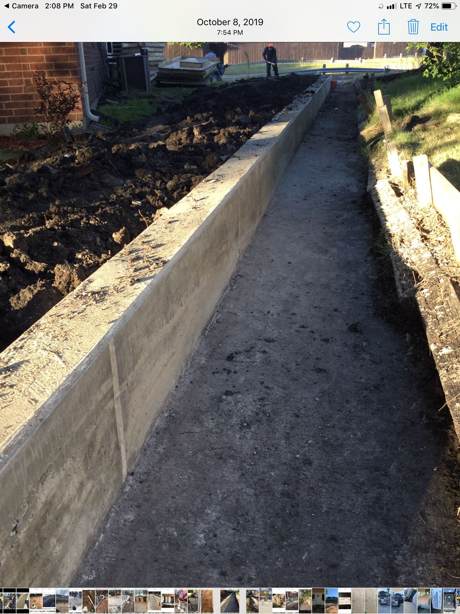 Poured concrete retaining wall under construction